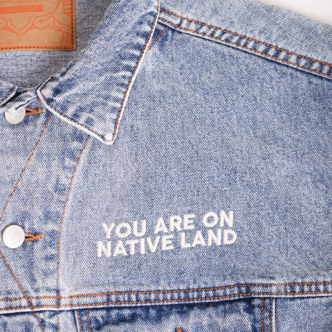 You Are On Native Land Vintage Wash Denim Jacket by UNE